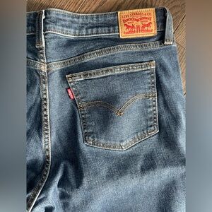 Levi's women’s  Blue Jeans —SUPERLOW BOOT 33

Washed but never worn